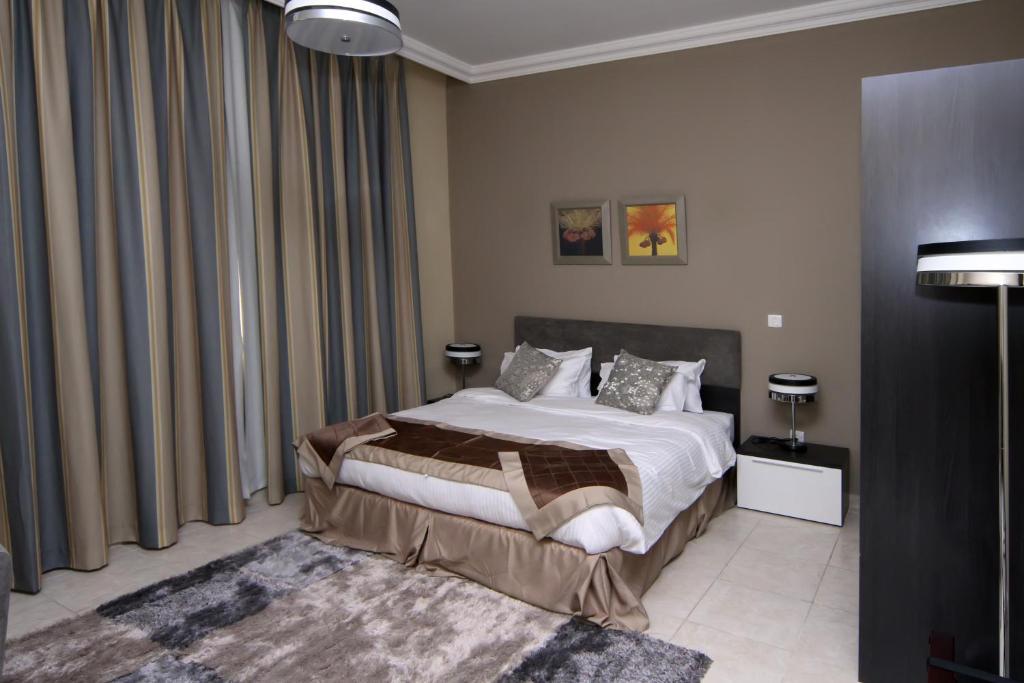 Magnum Hotel & Suites West Bay Doha Ruang foto