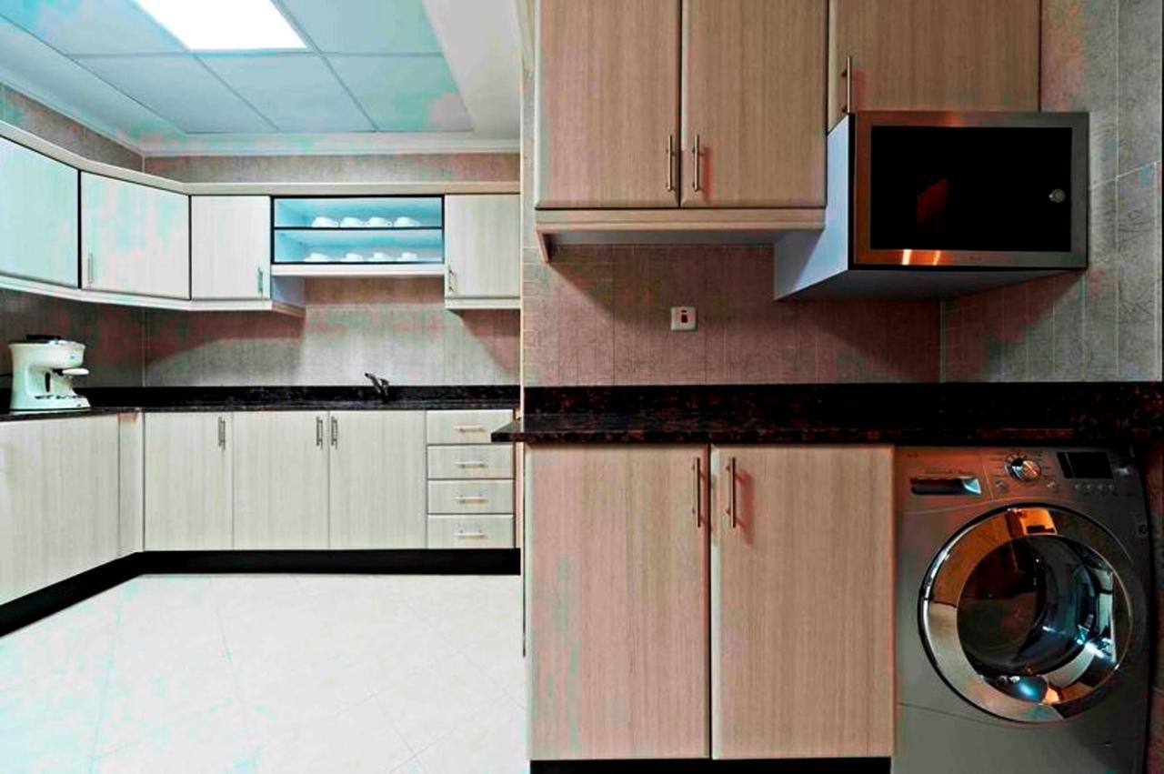 Magnum Hotel & Suites West Bay Doha Ruang foto